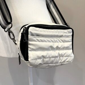 Think Royln White Patent Crossbody Bag with Striped Strap